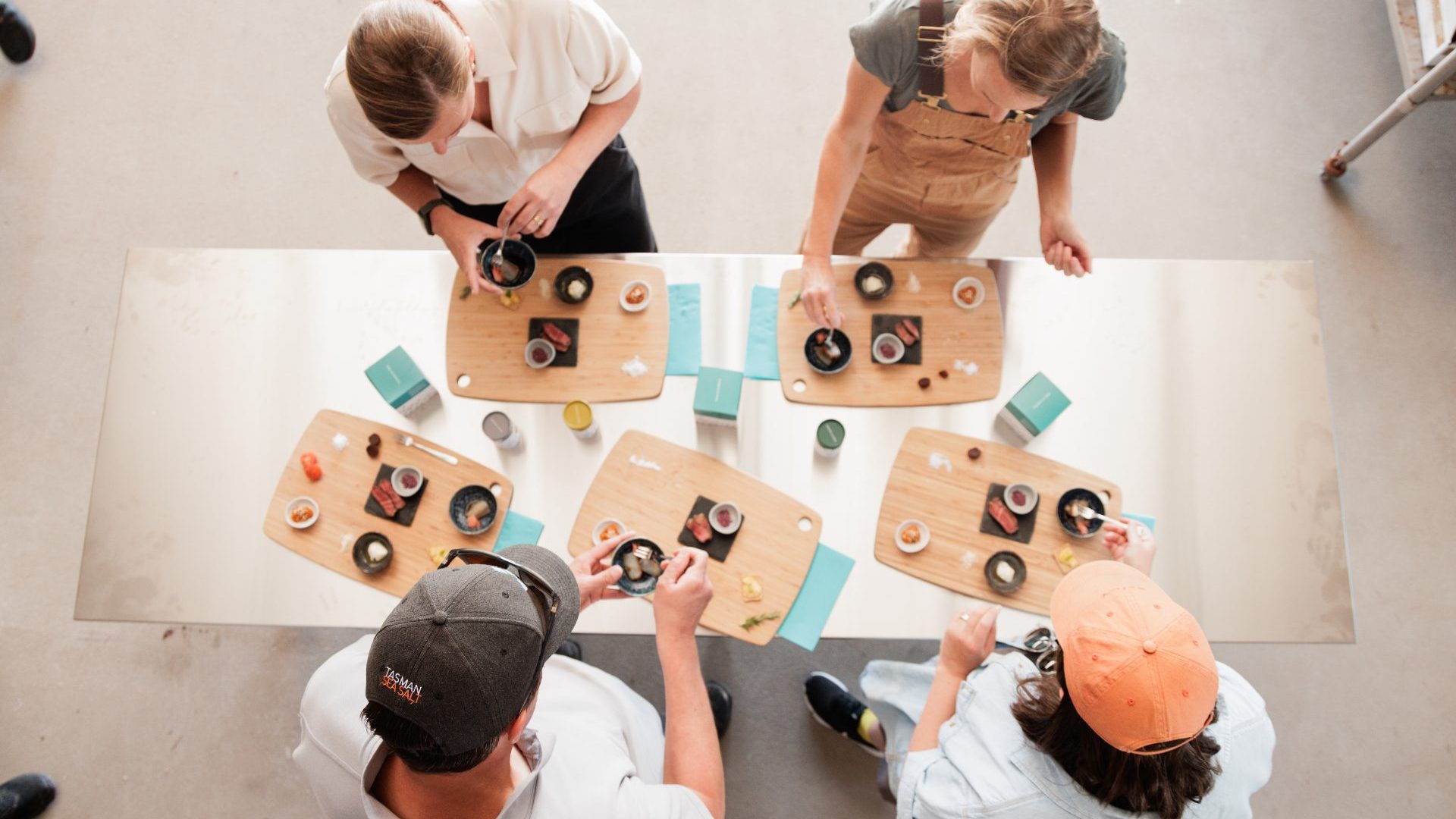 Four chefs put finishing touches to platters
