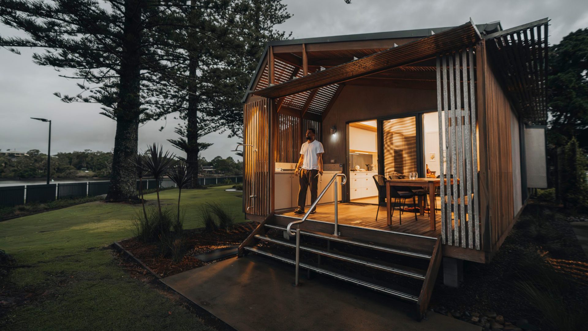 Man stands in communal kitchen
