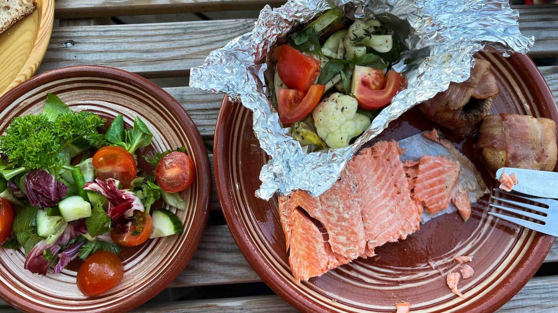 A dinner of roast salmon and vegetables.