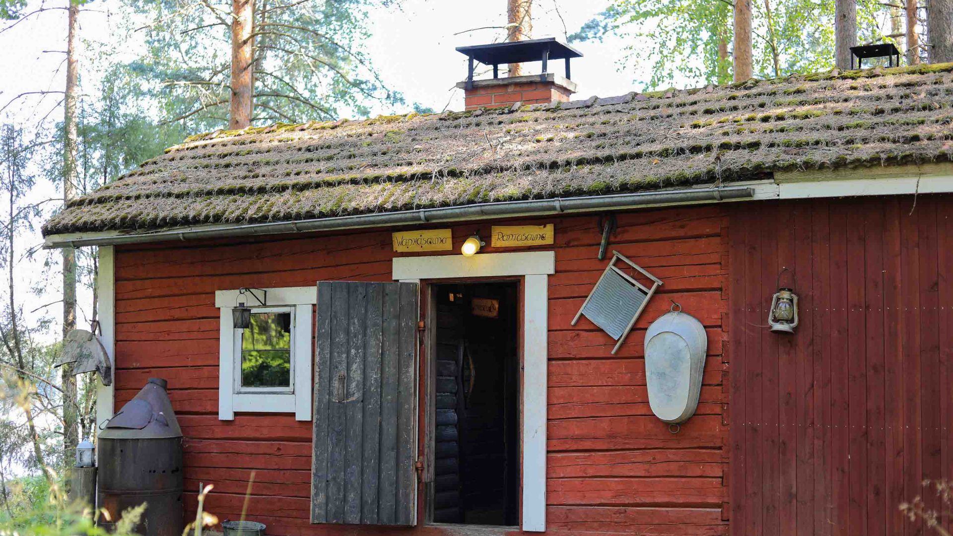 A red painted wooden sauna.